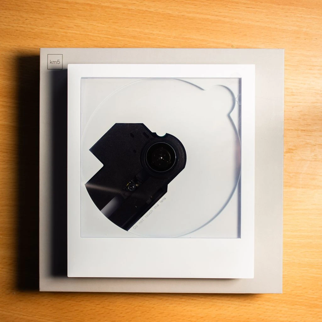 A compact disc under ISO 16363 lab inspection at the BestCDDVD verification bench.